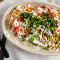 Tandoori Chicken Rice Bowl · Most popular!!
Bed of Basmati Rice, topped with cooked-to-perfection Tandoori Chicken, flavo...