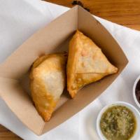 Masala Samosas (2) · Made from scratch pastry filled with seasons potatoes, accompanied with sauces of your choic...