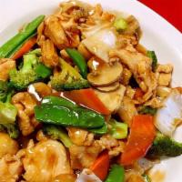 Chicken With Mixed Vegetables · With rice.