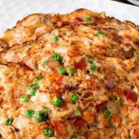 Chicken Egg Foo Young · With rice. choice of brown or yellow gravy.