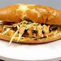 Mexican Sandwich/Torta · Sandwich loaded with your favorite meat, served with avocado, lettuce, onions, mayo, cheese.