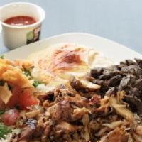 Mix Shawarma · Combination of marinated charbroiled beef and chicken.