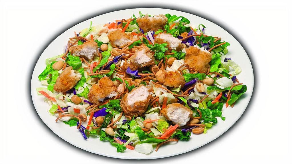 Oriental Chicken Salad - Crispy Or Grilled · Fresh salad blend, Asian style crunchy noodles, peanuts with your choice grilled or crispy chicken