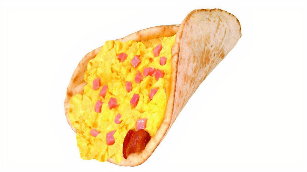 Breakfast Club On Pita · Scrambled Eggs and ham mixed together, bacon, American cheese, served on butter toasted pita bread