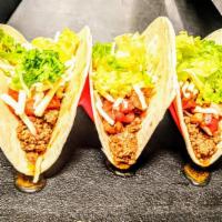Original Beef Tacos · Seasoned ground beef with shredded cheese, fresh pico de gallo, green leaf lettuce, and your...
