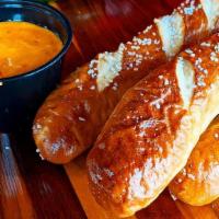 Soft Pretzels W/Guinness Beer Cheese · Soft pretzels served with beer cheese made with Guinness Irish Stout.
