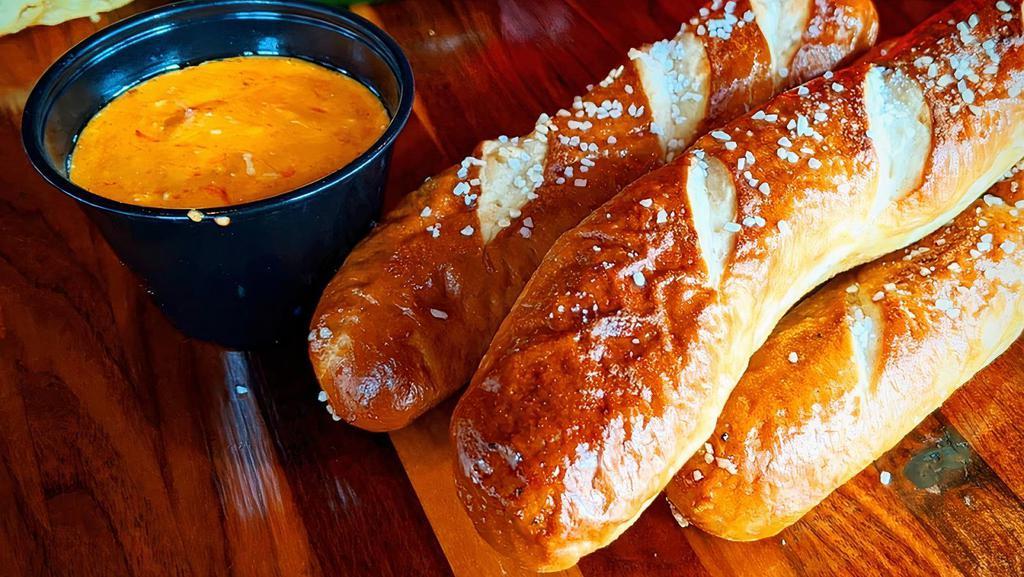 Soft Pretzels W/Guinness Beer Cheese · Soft pretzels served with beer cheese made with Guinness Irish Stout.