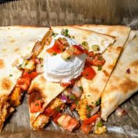 Cheese Quesdailla · Served with salsa and sour cream