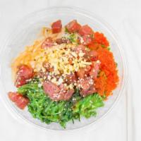 Da Kine · Marinated tuna, sweet onion, seaweed salad, ma sago, green onion, og sauce, ponzu.Contains g...