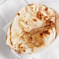 Garlic Naan · Our freshly baked hand-tossed bread with garlic and cilantro.