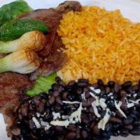Carne Asada · Served with rice, beans, onion and jalapeno