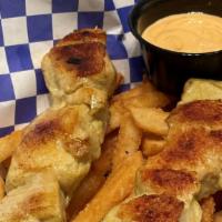 Chicken Skewers · Homemade seasoned grilled chicken breast. Comes with fries, and gauchos sauce.