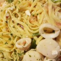 Seafood Pasta Athenia · Sauteed calamari, shrimp, and scallops, linguini, tomatoes, green peppers, and onions, tosse...