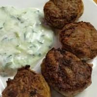 Falafel · Vegetarian. Vegan. Gluten Free. With hummus and pita. Ground fava beans and spices, deep fri...
