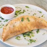 Chicken Pesto Calzone · Oven-roasted chicken breast, sweet basil pesto, grilled bell peppers, balsamic roma tomatoes...