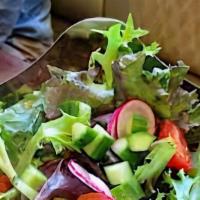 Garden Salad · Romaine and iceberg mix, tomatoes, red onions, cucumbers, croutons and our creamy house vina...