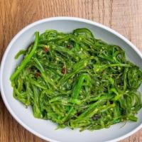 Seaweed Salad [Gf, V] · Seaweed salad seasoned with sesame oil + vinegar dressing + sesame seeds.