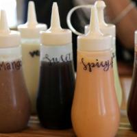 Extra Scratch-Made Sauces · Scratch-made signature sauces.