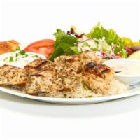 Grilled Chicken Kebob Feast · Two kebobs served with Taziki sauce, a side Greek Salad, a Baked Pita Chip, and your choice ...