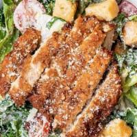 Kale Chik'N Caesar · Kale + Romaine Blend, Hand-Battered Chik'n, Tomatoes, Croutons, Parmesan Cheese, Caesar Dres...