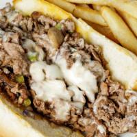Philly · Chicken or steak topped with green peppers, fresh mushrooms, onions, and Swiss cheese on a g...