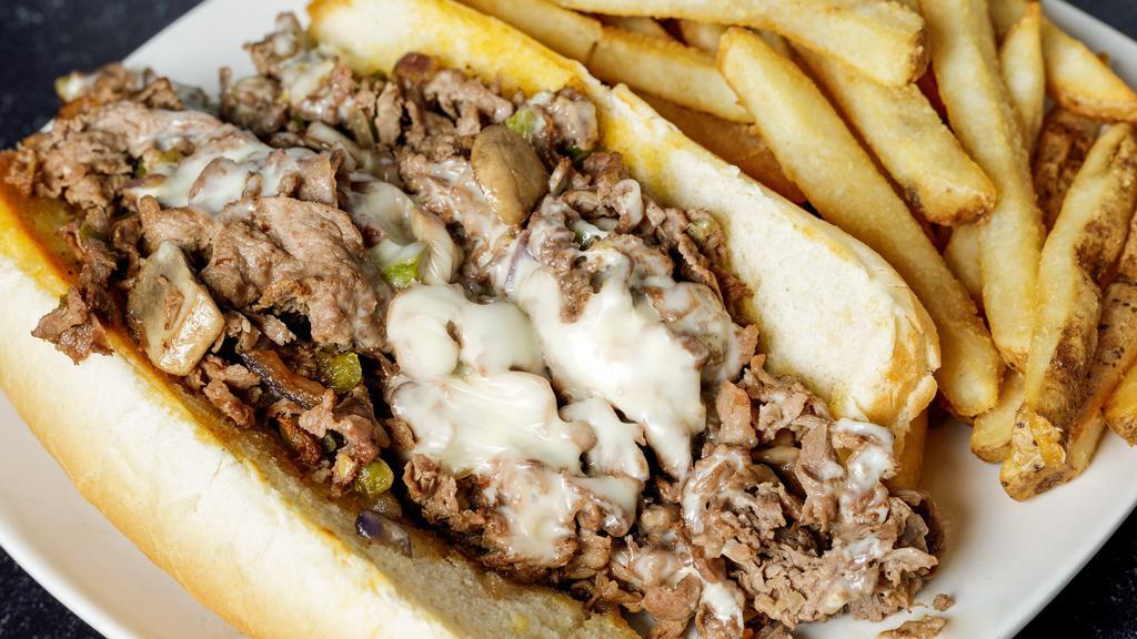 Philly · Chicken or steak topped with green peppers, fresh mushrooms, onions, and Swiss cheese on a grilled hoagie.