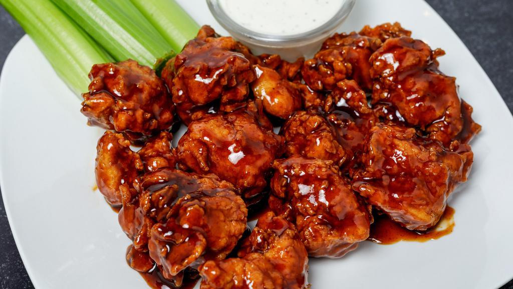 Hand Breaded Boneless Chicken Wings · Juicy all-white meat, tossed in your choice of sauce.