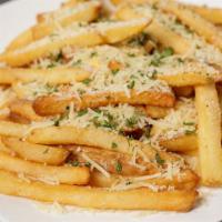 Truffle Fries · Crispy fries tossed with grated parmesan, parsley and white truffle oil then topped with shr...