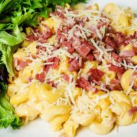 Bacon Macaroni & Cheese · Classic white cheddar and craft beer cheese with twisted elbow macaroni topped with diced ma...
