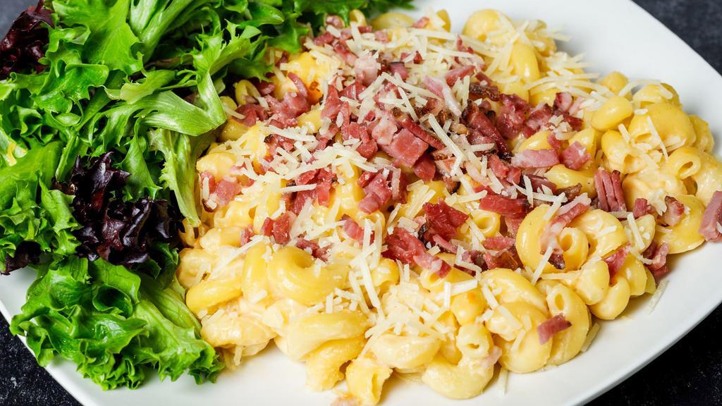 Bacon Macaroni & Cheese · Classic white cheddar and craft beer cheese with twisted elbow macaroni topped with diced market-style shoulder bacon and shredded parmesan.