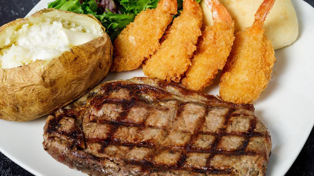 New York Strip Steak · 10 oz hand-cut, lightly seasoned, and charbroiled. Served with choice of two sides and a dinner roll. Add 4 breaded shrimp for $4.00.