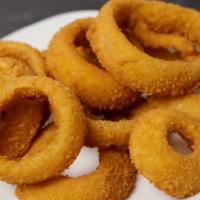 Onion Rings · Sweet colossal onion rings battered breaded and fried.