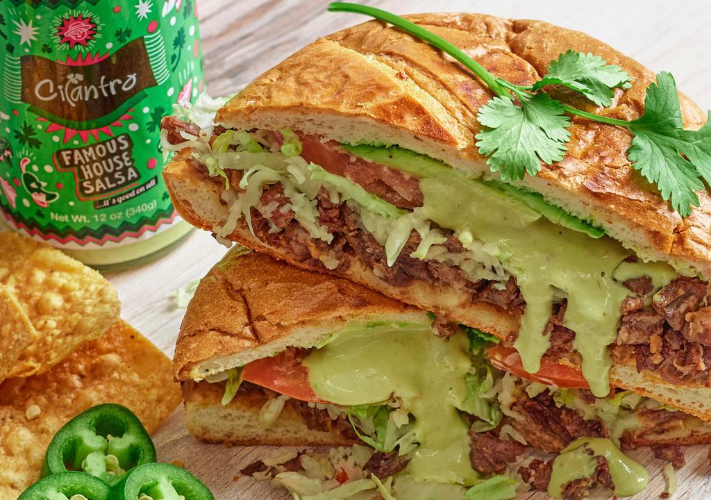 Tortas · Served with: lettuce, tomato, avocado, beans, cheese and sour cream.