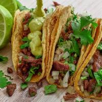 Tacos · Single taco served with: Onions and cilantro or lettuce and tomato. Note : Sour cream, Chees...