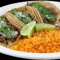 Taco Dinner · Three tacos your choice of meat. Dinner comes with rice & beans. 
Note: Cheese, sour cream a...