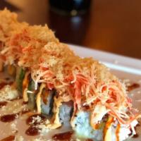 Volcano Specialty Roll · Eight pieces. Spicy tuna, cucumber, topped with avocado, spicy crab salad, crunchy and four ...