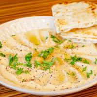 Hummus Small · A smooth thick mixture of mashed chickpeas, tahini, oil, lemon juice, and garlic, served wit...
