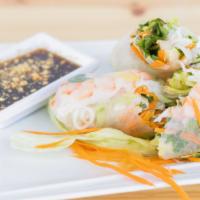 Spring Rolls · Hand rolled rice paper with fresh noodles and fresh vegetables. You can choose your protean.