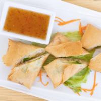 Thai Egg Rolls · Homemade and deep fried to a golden brown.  Served with homemade dipping sauce