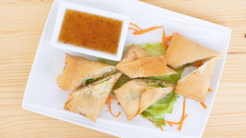 Thai Egg Rolls · Homemade and deep fried to a golden brown.  Served with homemade dipping sauce