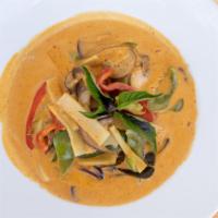 Red Curry · Gluten free. Red Curry, Coconut Milk, Egg Plant, Bell Peppers, Bamboo Shoot, Lime Leaves and...
