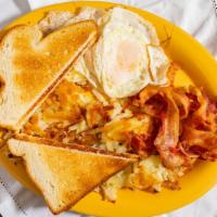 Broken Yolk House Breakfast · 3 eggs, home fries, toast and choice of bacon, ham, sausage, steak or corned beef hash, chic...