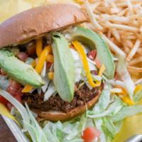 Taco Burger · Hacienda ground beef, avocado, lettuce, tomato, chihuahua cheese, sriracha aioli, brioche bun