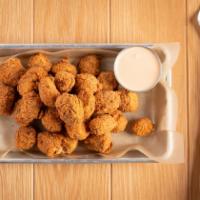 Gutter Balls · Chicken fried cheese curds, spicy ranch dressing.