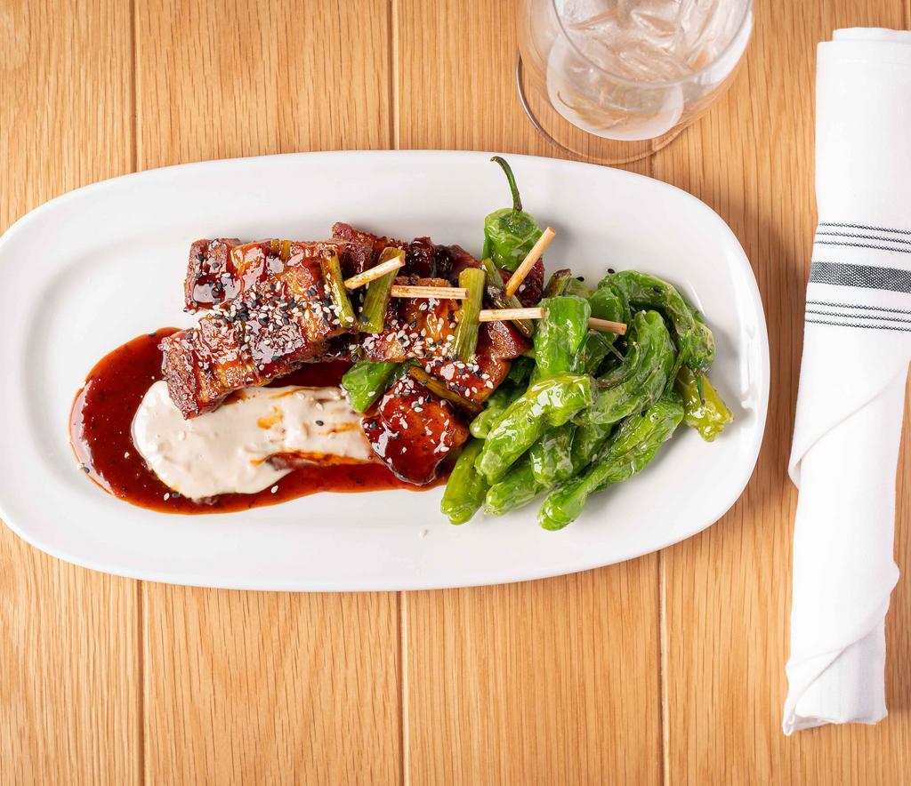 Pork Belly Yakitori · Korean glazed pork belly, shishito peppers, ginger soy aioli.