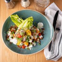 New Style Wedge · Romaine wedge, cucumbers, tomatoes, bacon, dill, everything spice, green onion, herb sour cr...