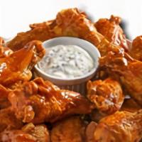 Whole Wings · Our wings are always fried to perfection and come tossed in your choice of Krispy, tradition...