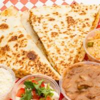 Quesadilla Flour Combo · Flour tortilla melted cheese, choice of meat, rice and beans.