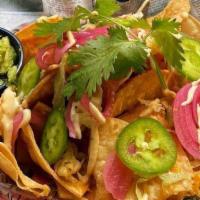Side Chick Nachos · Chicken or vegetarian - house made tortilla chips, loaded with lettuce, tomatoes, pickled on...