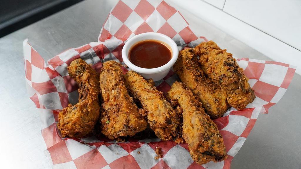 Fried Ribs · Our famous baby back ribs, sliced, battered and deep fried. Served with Oklahoma’s Original Head Country BBQ sauce.